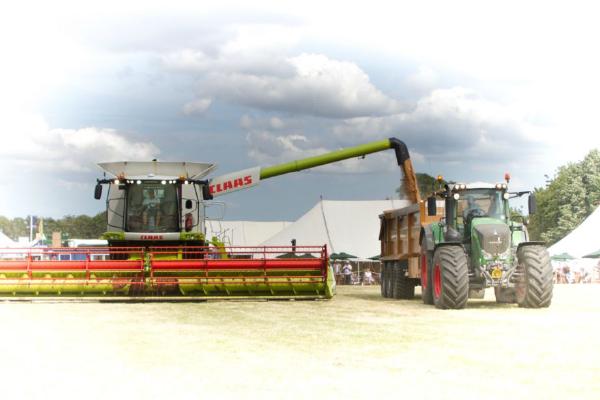 Combine and Tractor at Work (%!s(<nil>)) - 